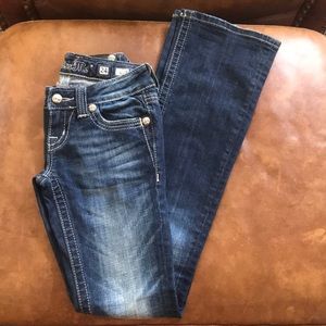 Miss Me jeans size 24 inseam 34. Missing one jewel
